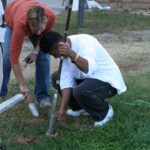 Students augering to determine their school soil types